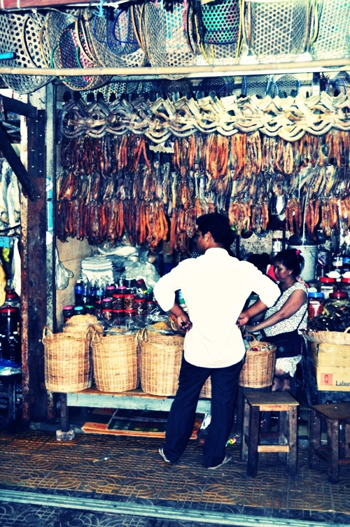 Food stall selling preserved meats in Siem Reap, Cambodia.
