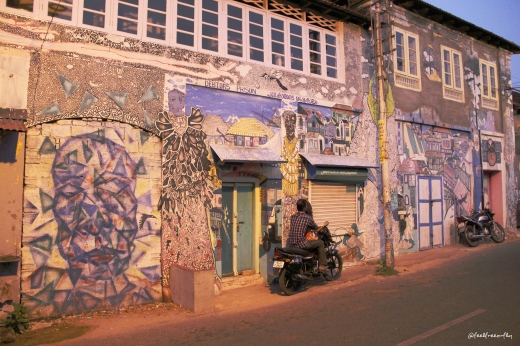 Building wall covered with graffiti in Fort Kochi.